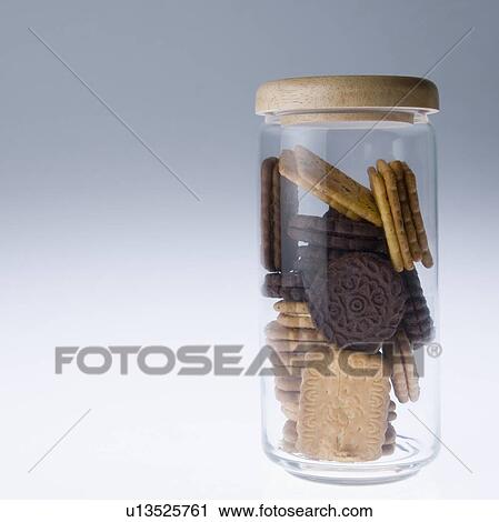 Stock Image - Close-up of a jar of various biscuits. Fotosearch