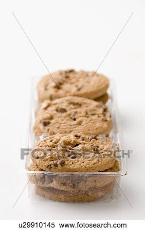Close-up of biscuits in a plastic container View Large Photo Image Stock Photography - Close-up of biscuits in a plastic container. Fotosearch