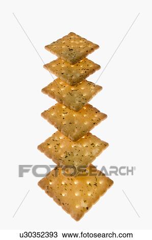 Stock Image - Close-up of biscuits in a row. Fotosearch