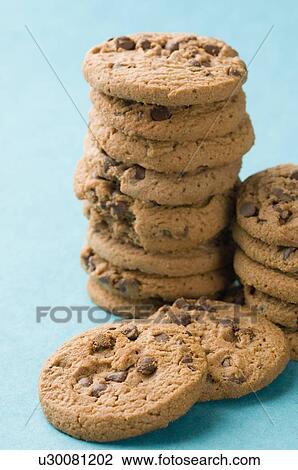 Stock Image - Close-up of brown biscuits. Fotosearch
