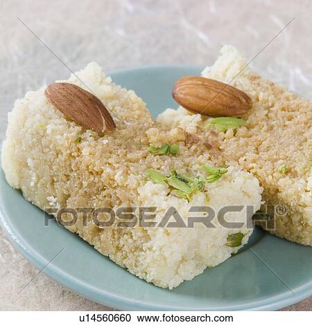 Stock Image - Close-up of milk cake in a saucer. Fotosearch
