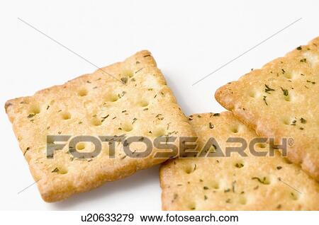 Close-up of three biscuits View Large Photo Image Stock Photo - Close-up of three biscuits. Fotosearch