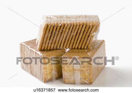 Close-up of three packet of biscuits View Large Photo Image Stock Photo - Close-up of three packet of biscuits. Fotosearch