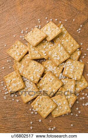 Stock Photo - High angle view of biscuits with sugar candies. Fotosearch