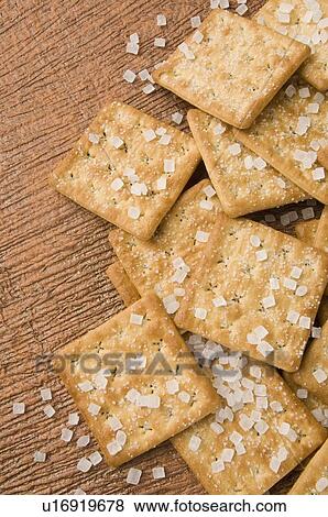 Stock Photo - High angle view of biscuits with sugar candies. Fotosearch