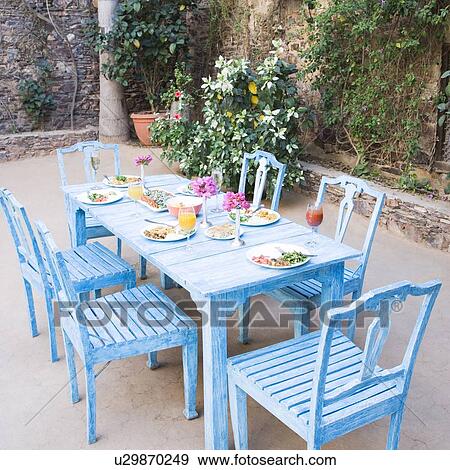 Stock Photo - Food served on a dining table. Fotosearch