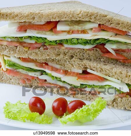 Close-up of a sandwich in a plate View Large Photo Image Stock Photo - Close-up of a sandwich in a plate. Fotosearch