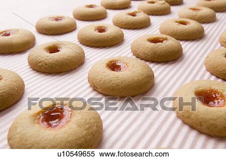 Stock Photography - Close-up of biscuits in a row. Fotosearch