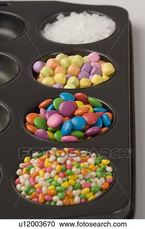 Close-up of candies with jellybeans in a serving tray View Large Photo Image Stock Image - Close-up of candies with jellybeans in a serving tray. Fotosearch