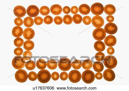 Stock Photograph - Close-up of carrot slices in shape of rectangles. Fotosearch