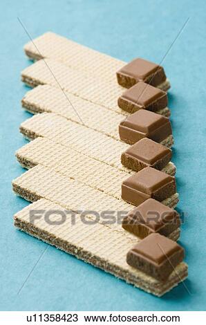 Close-up of chocolate bars on wafers View Large Photo Image Stock Image - Close-up of chocolate bars on wafers. Fotosearch