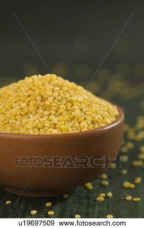 Close-up of fried Split Green grams in a bowl View Large Photo Image Stock Photo - Close-up of fried Split Green grams in a bowl. Fotosearch
