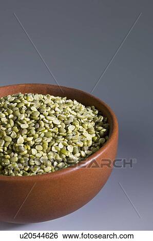 Stock Photograph - Close-up of Split Green grams in a bowl. Fotosearch