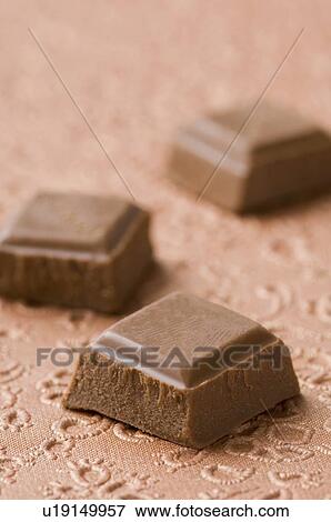 Close-up of three chocolate bars View Large Photo Image Stock Photo - Close-up of three chocolate bars. Fotosearch