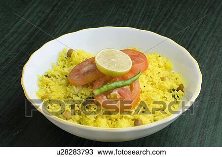 Stock Image - Close-up of a bowl of pulao. Fotosearch