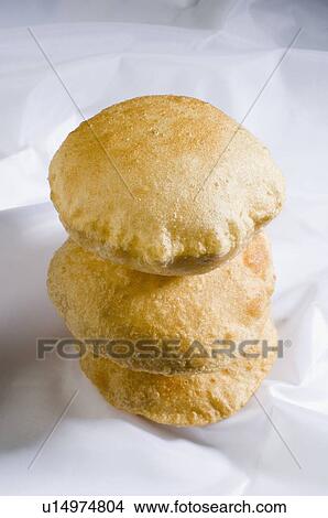 Picture - Close-up of a stack of poories. Fotosearch