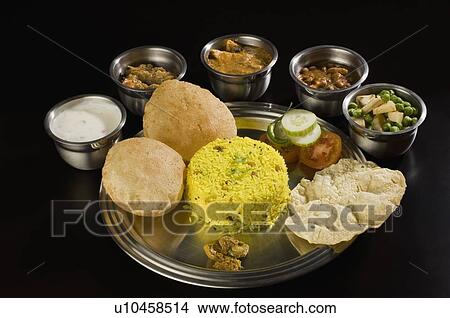 Picture - Close-up of assorted Indian food. Fotosearch