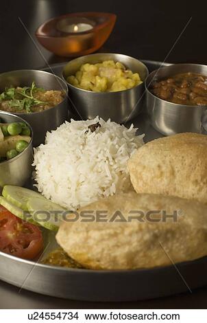 Picture - Close-up of assorted Indian food. Fotosearch