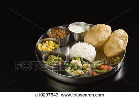 Close-up of assorted Indian food View Large Photo Image Stock Image - Close-up of assorted Indian food. Fotosearch