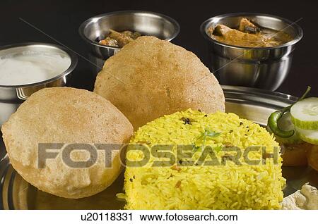 Close-up of assorted Indian food View Large Photo Image Stock Image - Close-up of assorted Indian food. Fotosearch