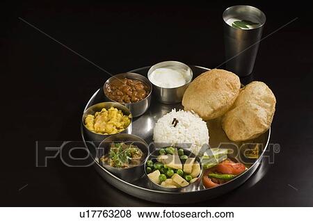 Close-up of assorted Indian food View Large Photo Image Stock Photo - Close-up of assorted Indian food. Fotosearch