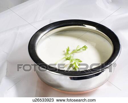 Stock Image - Close-up of curd in a bowl. Fotosearch