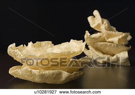 Stock Photo - Close-up of Papadoms. Fotosearch