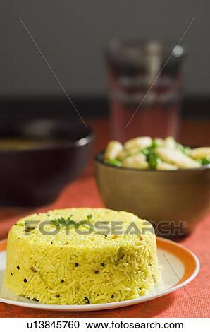 Stock Image - Close-up of pulao in a plate. Fotosearch