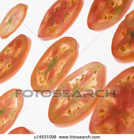 Stock Photo - Close-up of tomato slices. Fotosearch