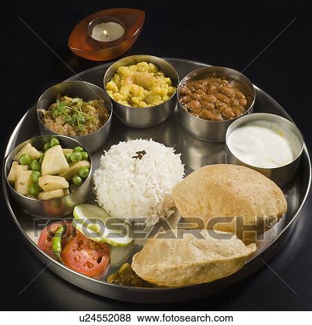 Stock Photo - High angle view of assorted Indian food. Fotosearch