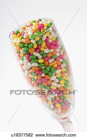 Close-up of a champagne flute filled with jellybeans View Large Photo Image Stock Image - Close-up of a champagne flute filled with jellybeans. Fotosearch