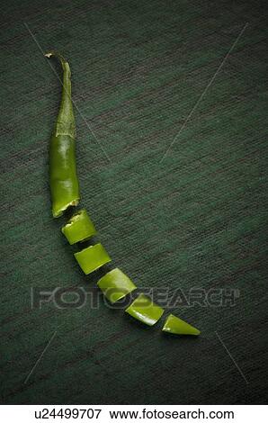 Stock Photo - Close-up of a green chili pepper. Fotosearch