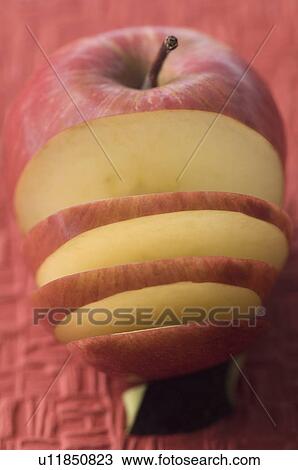 Close-up of a sliced apple View Large Photo Image Stock Image - Close-up of a sliced apple. Fotosearch