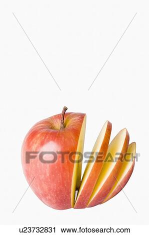 Close-up of a sliced apple View Large Photo Image Stock Image - Close-up of a sliced apple. Fotosearch