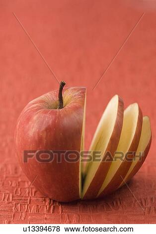 Stock Photo - Close-up of a sliced apple. Fotosearch