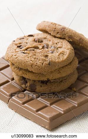 Close-up of brown biscuits on a chocolate bar View Large Photo Image Stock Image - Close-up of brown biscuits on a chocolate bar. Fotosearch