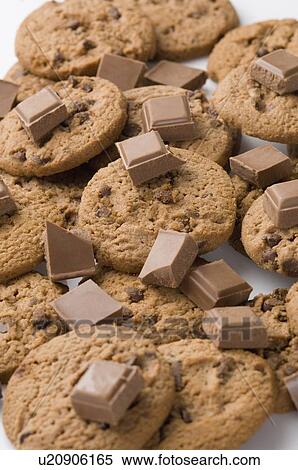 Close-up of pieces of chocolates on brown biscuits View Large Photo Image Stock Photography - Close-up of pieces of chocolates on brown biscuits. Fotosearch