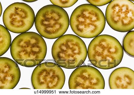Stock Image - Close-up of slices of eggplants. Fotosearch