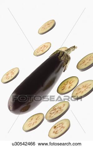 Stock Photograph - Close-up of slices of eggplants. Fotosearch