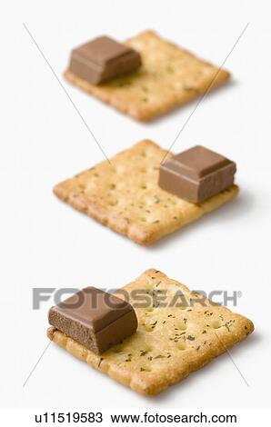 Close-up of three pairs of chocolate bars and biscuits View Large Photo Image Stock Image - Close-up of three pairs of chocolate bars and biscuits. Fotosearch
