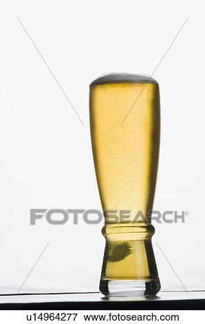 Stock Photo - Close-up of a glass of beer. Fotosearch