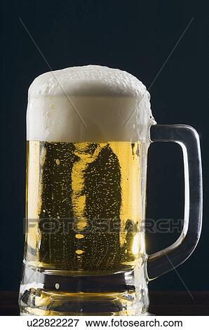 Stock Photo - Close-up of a glass of beer. Fotosearch