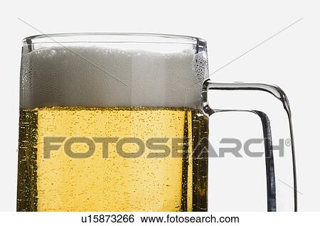 Stock Photograph - Close-up of a glass of beer. Fotosearch