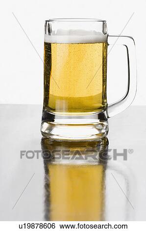 Stock Photograph - Close-up of a glass of beer. Fotosearch