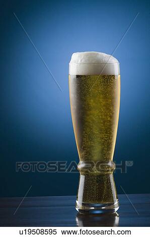 Stock Photography - Close-up of a glass of beer. Fotosearch