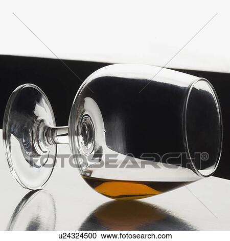 Stock Image - Close-up of a glass of red wine. Fotosearch