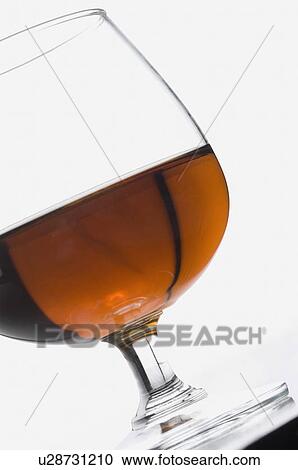 Close-up of a glass of red wine View Large Photo Image Stock Image - Close-up of a glass of red wine. Fotosearch