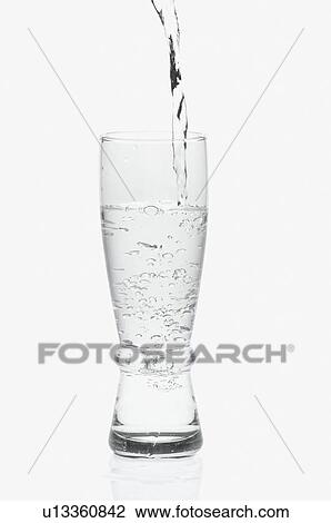Close-up of soda being poured into a glass View Large Photo Image Stock Image - Close-up of soda being poured into a glass. Fotosearch