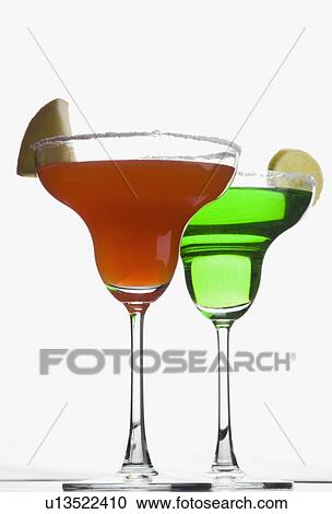Close-up of two glasses of margarita View Large Photo Image Stock Image - Close-up of two glasses of margarita. Fotosearch