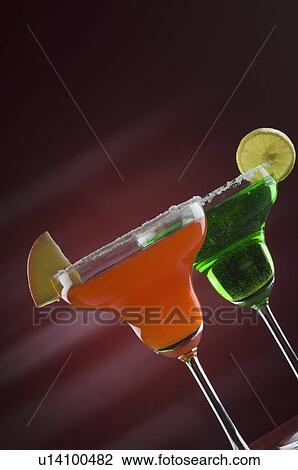 Close-up of two glasses of margarita View Large Photo Image Stock Image - Close-up of two glasses of margarita. Fotosearch